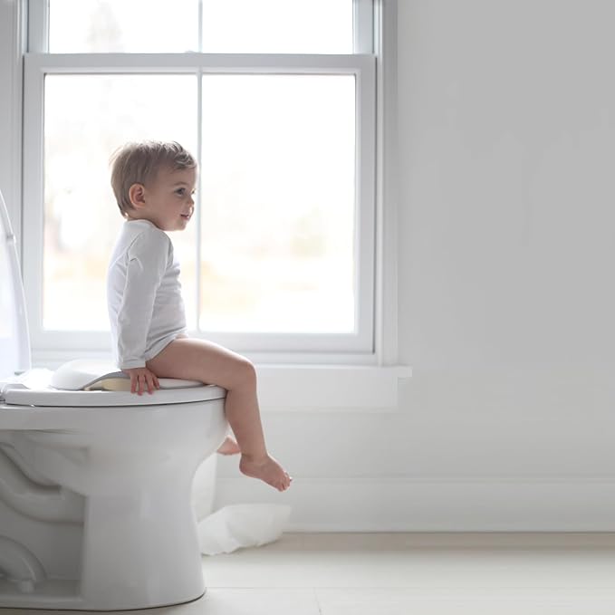 Ubbi Adjustable Toilet Trainer for Toddlers in Potty Training with Built-in Handles and Bonus Potty Hook for Easy Storage, Gray
