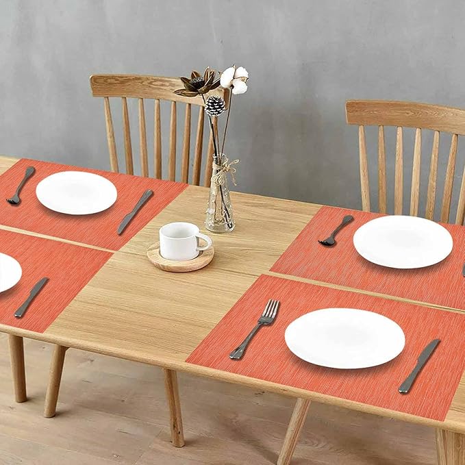 GIVERARE Placemats Set of 4, Heat-Resistant Woven Vinyl Placemat, Non-Slip Washable PVC Table Mat, Easy to Clean Premium Plastic Mats for Dining, Kitchen Table (Orange)