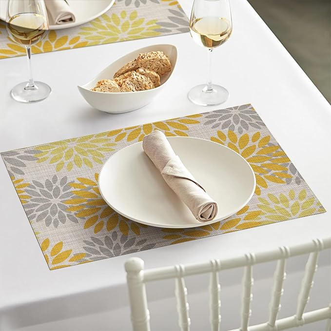 Artoid Mode Floral Plastic Placemats Set of 4, 12x18 Inch Washable Non-Slip Plastic Vinyl Place Mats for Party Kitchen Dining Decor, Yellow
