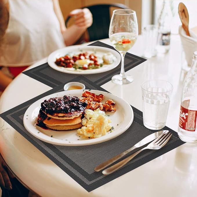 GIVERARE Placemats Set of 4, Heat-Resistant Woven Vinyl Placemat, Non-Slip Washable PVC Table Mat, Easy to Clean Premium Plastic Mats for Dining, Kitchen Table (Black+Gold)
