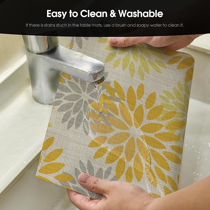 Artoid Mode Floral Plastic Placemats Set of 4, 12x18 Inch Washable Non-Slip Plastic Vinyl Place Mats for Party Kitchen Dining Decor, Yellow