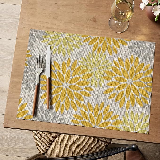 Artoid Mode Floral Plastic Placemats Set of 4, 12x18 Inch Washable Non-Slip Plastic Vinyl Place Mats for Party Kitchen Dining Decor, Yellow
