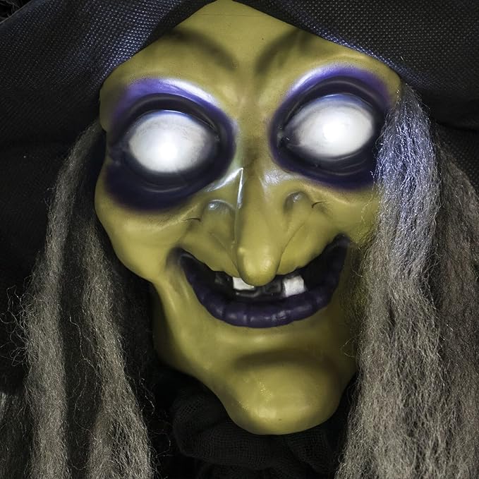 Haunted Hill Farm 9.5-Ft. Animatronic Witch, Indoor or Covered Outdoor Halloween Decoration, Prop With Light-up White Eyes, Poseable and Battery Operated Fright Prop for Home