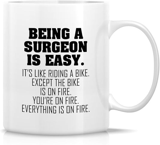 Retreez Funny Surgeon Mug - 11 Oz Ceramic Coffee Cup - Being A Surgeon Is Easy Mug - Humorous Gift for Surgeons, Surgical trainee, Surgical Resident, Medical Professionals - Thank-You, Graduation Gift