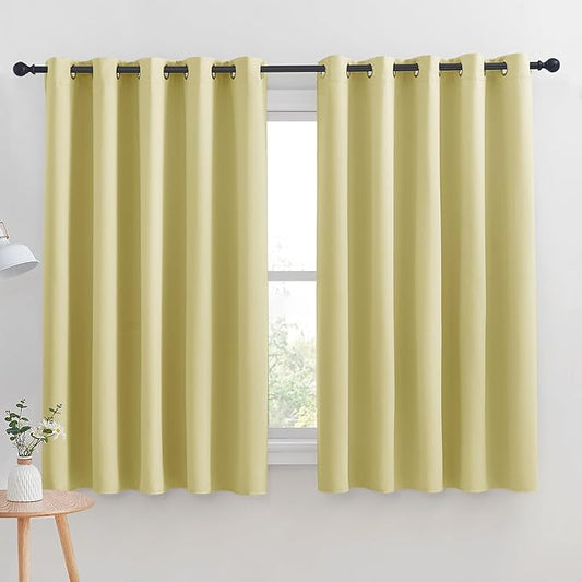 NICETOWN Thermal Insulated Paler Yellow Blackout Curtains for Bedroom, Set of 2, 70 by 63 inches Long, Window Treatment Solid Grommet Room Darkening Drape Panels for Bedroom